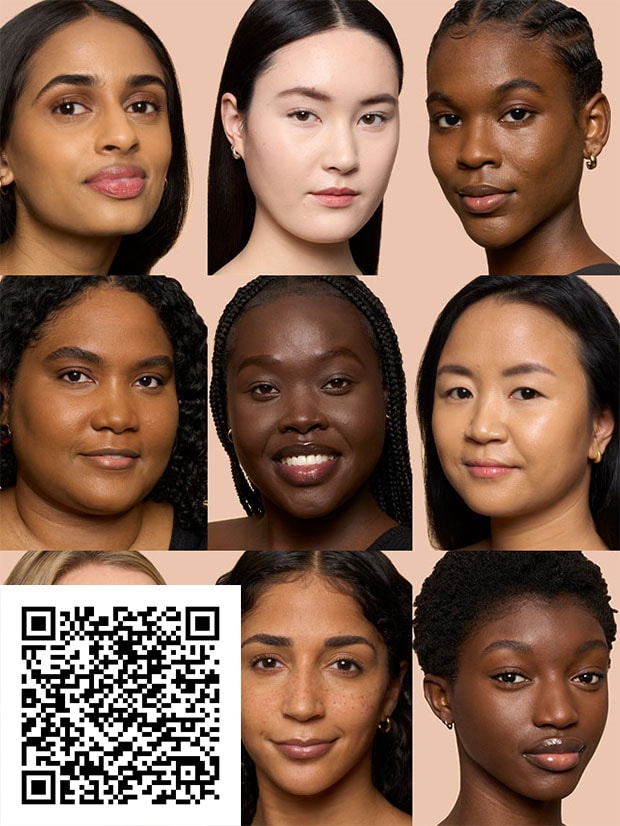 Model with foundation and foundation brush on face